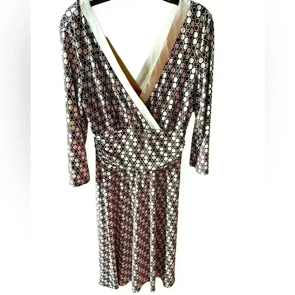 Size 14 surplice ‎ style faux wrap dress. Gathered waist. Silky feel & stretchy.